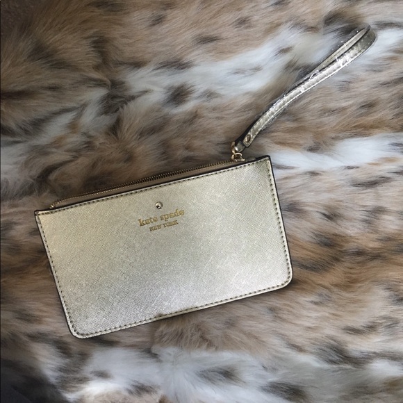 kate spade Handbags - NWT gold Kate spade ♠️ wristlet